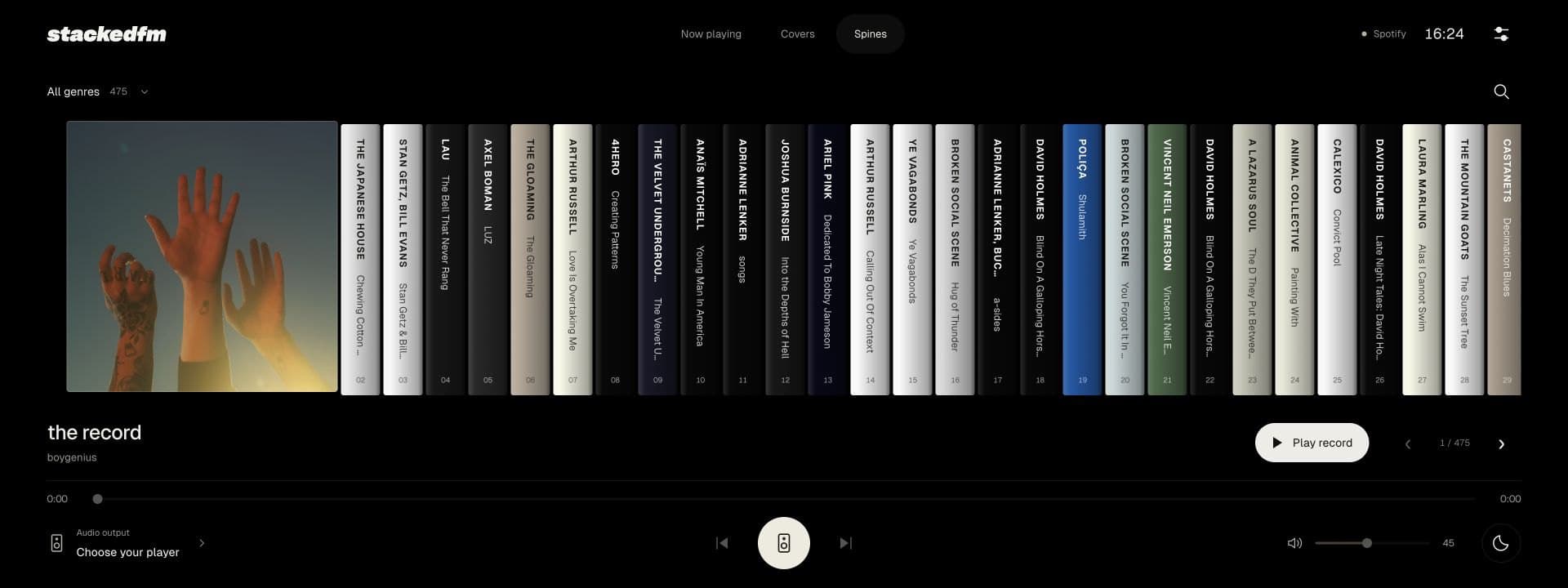 StackedFM's Spines view: the record by boygenius shown as a cover, beside a long row of album spines.